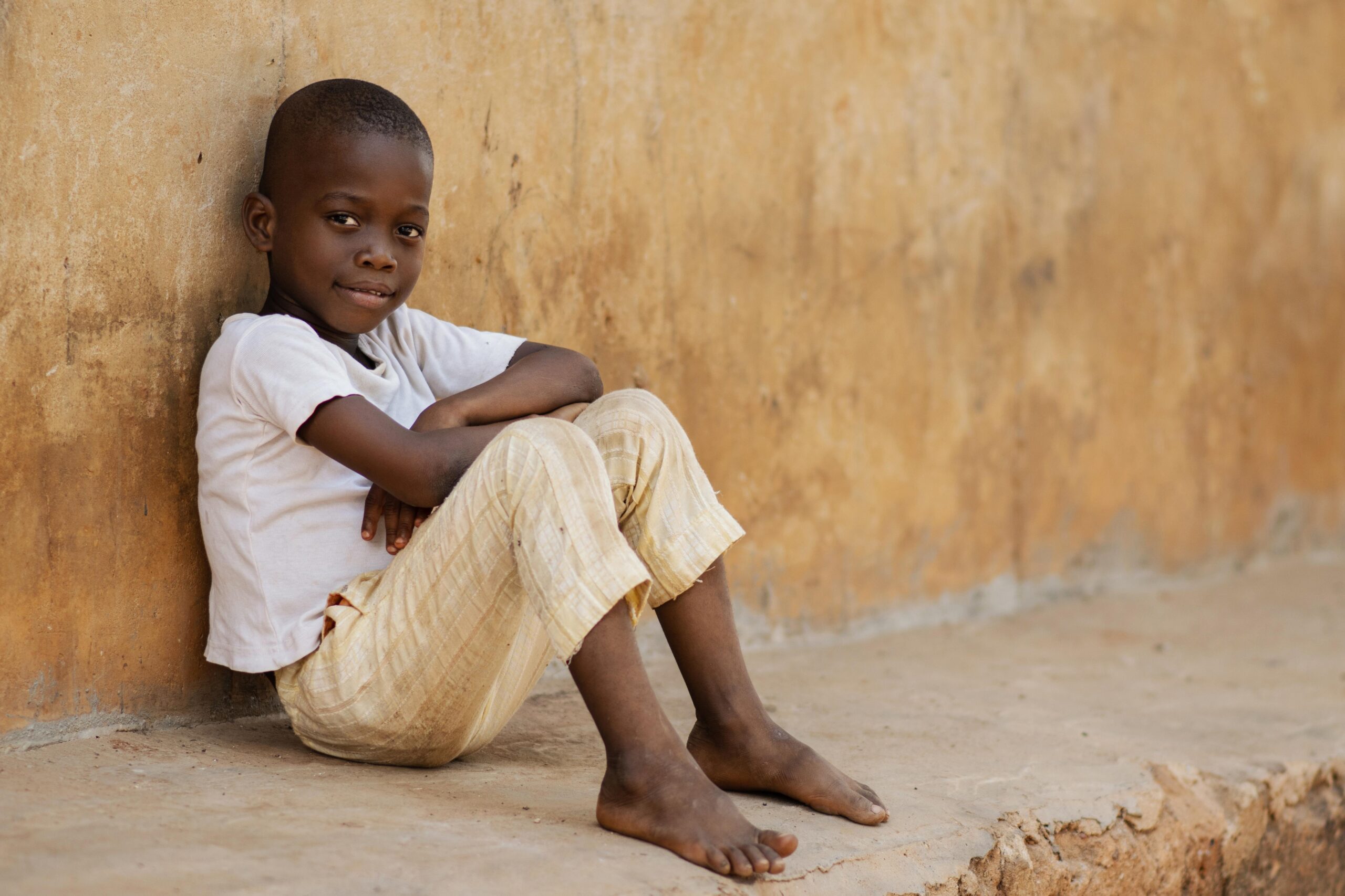full-shot-kid-sitting-outdoors